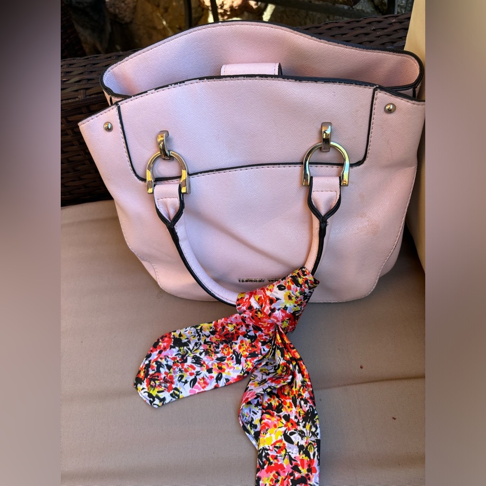 London Fog pink purse with multiple compartments.